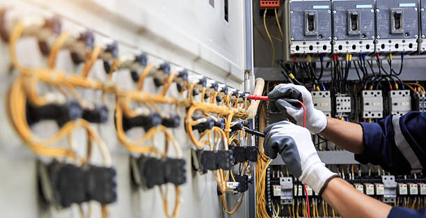 Professional Electrician technician working in Ridge Manor, FL